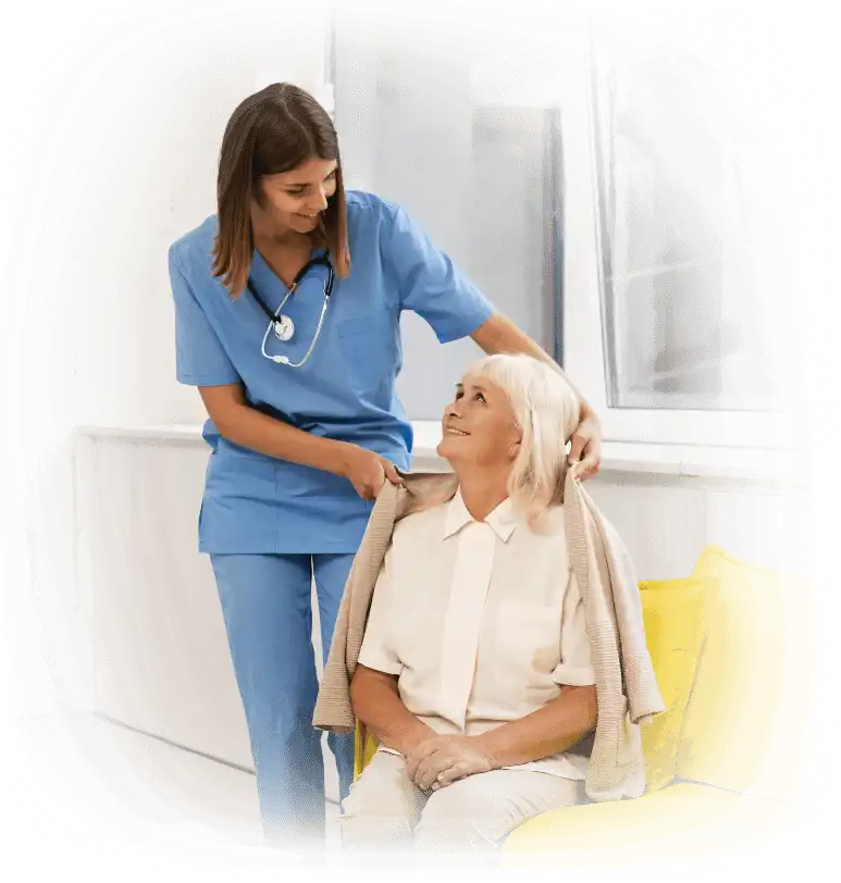 nurse-helping-old-woman-with-her-coat