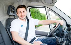 young man driving ambulance paramedic